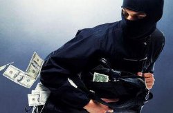 В Киеве вооруженный бандит ограбил обменник
